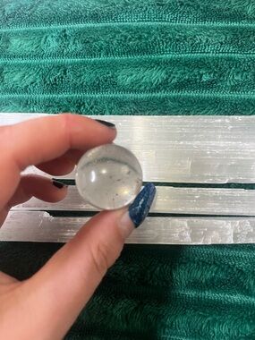 Clear Quartz sphere with Black Tourmaline inclusions!